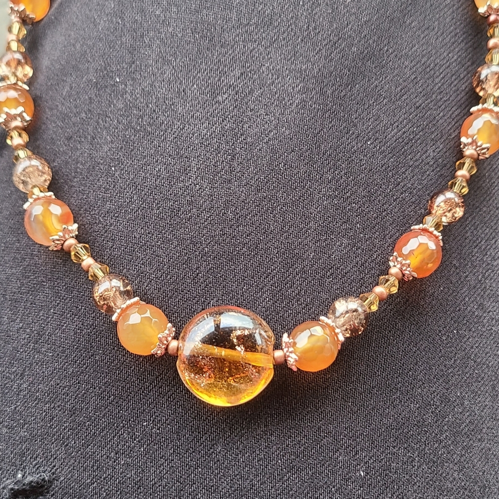 Handspun glass and Carnelian crystal necklace.  Adjustable,  handmade.